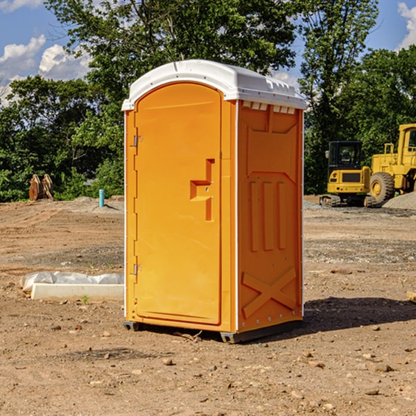 how often are the portable restrooms cleaned and serviced during a rental period in Loman MN